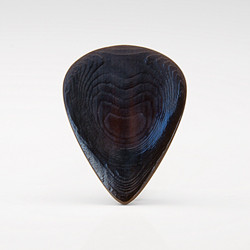 The Nero Jazz series custom water buffalo horn plectrum is a small extremely comfortable pick with a 3d contoured body and a recessed grip area that greatly enhances control and precision.